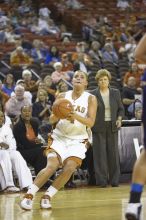 Guard Erika Arriaran, #4.  The lady longhorns defeated the Oral Roberts University's (ORU) Golden Eagles 79-40 Saturday night.

Filename: SRM_20061125_1312441.jpg
Aperture: f/2.8
Shutter Speed: 1/400
Body: Canon EOS-1D Mark II
Lens: Canon EF 80-200mm f/2.8 L