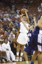 Guard Erika Arriaran, #4.  The lady longhorns defeated the Oral Roberts University's (ORU) Golden Eagles 79-40 Saturday night.

Filename: SRM_20061125_1312462.jpg
Aperture: f/2.8
Shutter Speed: 1/400
Body: Canon EOS-1D Mark II
Lens: Canon EF 80-200mm f/2.8 L