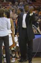 The lady longhorns defeated the Oral Roberts University's (ORU) Golden Eagles 79-40 Saturday night.

Filename: SRM_20061125_1314484.jpg
Aperture: f/2.8
Shutter Speed: 1/400
Body: Canon EOS-1D Mark II
Lens: Canon EF 80-200mm f/2.8 L