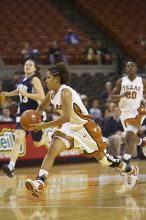 Guard Carla Cortijo, #3.  The lady longhorns defeated the Oral Roberts University's (ORU) Golden Eagles 79-40 Saturday night.

Filename: SRM_20061125_1319222.jpg
Aperture: f/2.8
Shutter Speed: 1/400
Body: Canon EOS-1D Mark II
Lens: Canon EF 80-200mm f/2.8 L