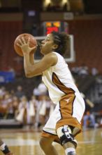 Guard Carla Cortijo, #3.  The lady longhorns defeated the Oral Roberts University's (ORU) Golden Eagles 79-40 Saturday night.

Filename: SRM_20061125_1321582.jpg
Aperture: f/2.8
Shutter Speed: 1/400
Body: Canon EOS-1D Mark II
Lens: Canon EF 80-200mm f/2.8 L