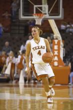 Guard Erika Arriaran, #4.  The lady longhorns defeated the Oral Roberts University's (ORU) Golden Eagles 79-40 Saturday night.

Filename: SRM_20061125_1322506.jpg
Aperture: f/2.8
Shutter Speed: 1/400
Body: Canon EOS-1D Mark II
Lens: Canon EF 80-200mm f/2.8 L