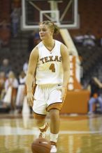 Guard Erika Arriaran, #4.  The lady longhorns defeated the Oral Roberts University's (ORU) Golden Eagles 79-40 Saturday night.

Filename: SRM_20061125_1322548.jpg
Aperture: f/2.8
Shutter Speed: 1/400
Body: Canon EOS-1D Mark II
Lens: Canon EF 80-200mm f/2.8 L