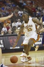 Forward Tiffany Jackson, #33.  The lady longhorns defeated the Oral Roberts University's (ORU) Golden Eagles 79-40 Saturday night.

Filename: SRM_20061125_1324562.jpg
Aperture: f/2.8
Shutter Speed: 1/400
Body: Canon EOS-1D Mark II
Lens: Canon EF 80-200mm f/2.8 L