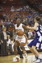 Forward Tiffany Jackson, #33.  The lady longhorns defeated the Oral Roberts University's (ORU) Golden Eagles 79-40 Saturday night.

Filename: SRM_20061125_1329046.jpg
Aperture: f/2.8
Shutter Speed: 1/400
Body: Canon EOS-1D Mark II
Lens: Canon EF 80-200mm f/2.8 L