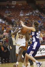 Forward Tiffany Jackson, #33.  The lady longhorns defeated the Oral Roberts University's (ORU) Golden Eagles 79-40 Saturday night.

Filename: SRM_20061125_1329067.jpg
Aperture: f/2.8
Shutter Speed: 1/400
Body: Canon EOS-1D Mark II
Lens: Canon EF 80-200mm f/2.8 L