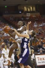 Forward Tiffany Jackson, #33.  The lady longhorns defeated the Oral Roberts University's (ORU) Golden Eagles 79-40 Saturday night.

Filename: SRM_20061125_1329109.jpg
Aperture: f/2.8
Shutter Speed: 1/400
Body: Canon EOS-1D Mark II
Lens: Canon EF 80-200mm f/2.8 L