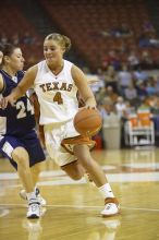 Guard Erika Arriaran, #4.  The lady longhorns defeated the Oral Roberts University's (ORU) Golden Eagles 79-40 Saturday night.

Filename: SRM_20061125_1333069.jpg
Aperture: f/2.8
Shutter Speed: 1/400
Body: Canon EOS-1D Mark II
Lens: Canon EF 80-200mm f/2.8 L