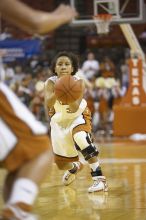 Guard Carla Cortijo, #3.  The lady longhorns defeated the Oral Roberts University's (ORU) Golden Eagles 79-40 Saturday night.

Filename: SRM_20061125_1338289.jpg
Aperture: f/2.8
Shutter Speed: 1/400
Body: Canon EOS-1D Mark II
Lens: Canon EF 80-200mm f/2.8 L