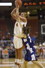 Guard Erika Arriaran, #4.  The lady longhorns defeated the Oral Roberts University's (ORU) Golden Eagles 79-40 Saturday night.

Filename: SRM_20061125_1338321.jpg
Aperture: f/2.8
Shutter Speed: 1/400
Body: Canon EOS-1D Mark II
Lens: Canon EF 80-200mm f/2.8 L