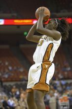 Forward Tiffany Jackson, #33.  The lady longhorns defeated the Oral Roberts University's (ORU) Golden Eagles 79-40 Saturday night.

Filename: SRM_20061125_1344085.jpg
Aperture: f/2.8
Shutter Speed: 1/400
Body: Canon EOS-1D Mark II
Lens: Canon EF 80-200mm f/2.8 L