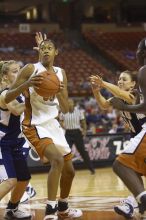 Forward Ashley Lindsey, #35.  The lady longhorns defeated the Oral Roberts University's (ORU) Golden Eagles 79-40 Saturday night.

Filename: SRM_20061125_1357123.jpg
Aperture: f/2.8
Shutter Speed: 1/400
Body: Canon EOS-1D Mark II
Lens: Canon EF 80-200mm f/2.8 L