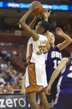 Forward Ashley Lindsey, #35.  The lady longhorns defeated the Oral Roberts University's (ORU) Golden Eagles 79-40 Saturday night.

Filename: SRM_20061125_1358264.jpg
Aperture: f/2.8
Shutter Speed: 1/400
Body: Canon EOS-1D Mark II
Lens: Canon EF 80-200mm f/2.8 L