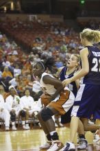 The lady longhorns defeated the Oral Roberts University's (ORU) Golden Eagles 79-40 Saturday night.

Filename: SRM_20061125_1358326.jpg
Aperture: f/2.8
Shutter Speed: 1/400
Body: Canon EOS-1D Mark II
Lens: Canon EF 80-200mm f/2.8 L