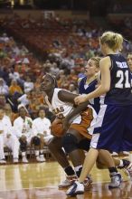 The lady longhorns defeated the Oral Roberts University's (ORU) Golden Eagles 79-40 Saturday night.

Filename: SRM_20061125_1358347.jpg
Aperture: f/2.8
Shutter Speed: 1/400
Body: Canon EOS-1D Mark II
Lens: Canon EF 80-200mm f/2.8 L