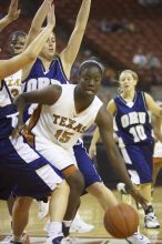 Guard and forward Gabriell Mattox, #15.  The lady longhorns defeated the Oral Roberts University's (ORU) Golden Eagles 79-40 Saturday night.

Filename: SRM_20061125_1403268.jpg
Aperture: f/2.8
Shutter Speed: 1/400
Body: Canon EOS-1D Mark II
Lens: Canon EF 80-200mm f/2.8 L