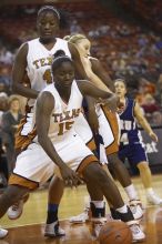 Guard and forward Gabriell Mattox, #15.  The lady longhorns defeated the Oral Roberts University's (ORU) Golden Eagles 79-40 Saturday night.

Filename: SRM_20061125_1403541.jpg
Aperture: f/2.8
Shutter Speed: 1/400
Body: Canon EOS-1D Mark II
Lens: Canon EF 80-200mm f/2.8 L