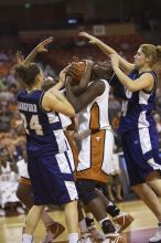 The lady longhorns defeated the Oral Roberts University's (ORU) Golden Eagles 79-40 Saturday night.

Filename: SRM_20061125_1404046.jpg
Aperture: f/2.8
Shutter Speed: 1/400
Body: Canon EOS-1D Mark II
Lens: Canon EF 80-200mm f/2.8 L