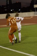 Leslie Imber, #15.  The lady longhorns beat Texas A&M 1-0 in soccer Friday night.

Filename: SRM_20061027_1913185.jpg
Aperture: f/4.0
Shutter Speed: 1/500
Body: Canon EOS 20D
Lens: Canon EF 80-200mm f/2.8 L