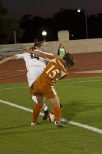 Leslie Imber, #15.  The lady longhorns beat Texas A&M 1-0 in soccer Friday night.

Filename: SRM_20061027_1913206.jpg
Aperture: f/4.0
Shutter Speed: 1/500
Body: Canon EOS 20D
Lens: Canon EF 80-200mm f/2.8 L