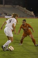 Leslie Imber, #15.  The lady longhorns beat Texas A&M 1-0 in soccer Friday night.

Filename: SRM_20061027_1922266.jpg
Aperture: f/4.0
Shutter Speed: 1/400
Body: Canon EOS 20D
Lens: Canon EF 80-200mm f/2.8 L