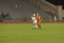 Greta Carter, #6.  The lady longhorns beat Texas A&M 1-0 in soccer Friday night.

Filename: SRM_20061027_1942202.jpg
Aperture: f/4.0
Shutter Speed: 1/640
Body: Canon EOS 20D
Lens: Canon EF 80-200mm f/2.8 L