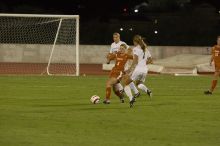 Jill Gilbeau, #4.  The lady longhorns beat Texas A&M 1-0 in soccer Friday night.

Filename: SRM_20061027_2050383.jpg
Aperture: f/4.0
Shutter Speed: 1/800
Body: Canon EOS 20D
Lens: Canon EF 80-200mm f/2.8 L