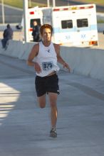 Scott Kimbell, bib #375, placed sixth overall, second in his class, with a time of 57:09 at The Girl Scout Scenic 10 Miler road race, Sunday, October 22, 2006.

Filename: SRM_20061022_0851525.jpg
Aperture: f/4.5
Shutter Speed: 1/250
Body: Canon EOS 20D
Lens: Canon EF 80-200mm f/2.8 L