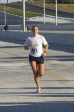 Nora Colligan, bib #661, placed second for the women with a time of 1:03:50 at The Girl Scout Scenic 10 Miler road race, Sunday, October 22, 2006.

Filename: SRM_20061022_0858369.jpg
Aperture: f/10.0
Shutter Speed: 1/250
Body: Canon EOS 20D
Lens: Canon EF 80-200mm f/2.8 L