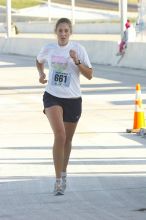 Nora Colligan, bib #661, placed second for the women with a time of 1:03:50 at The Girl Scout Scenic 10 Miler road race, Sunday, October 22, 2006.

Filename: SRM_20061022_0858380.jpg
Aperture: f/7.1
Shutter Speed: 1/250
Body: Canon EOS 20D
Lens: Canon EF 80-200mm f/2.8 L