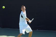 Texas' Dimitar Kutrovsky defeated Tech's Jose Muguruza 6-2 and 6-3.  The University of Texas (UT) men's tennis team defeated Georgia Tech (GT) Saturday, February 24, 2007..

Filename: SRM_20070224_1419500.jpg
Aperture: f/4.0
Shutter Speed: 1/3200
Body: Canon EOS-1D Mark II
Lens: Canon EF 80-200mm f/2.8 L