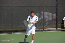 Texas' Dimitar Kutrovsky defeated Tech's Jose Muguruza 6-2 and 6-3.  The University of Texas (UT) men's tennis team defeated Georgia Tech (GT) Saturday, February 24, 2007..

Filename: SRM_20070224_1428468.jpg
Aperture: f/4.0
Shutter Speed: 1/8000
Body: Canon EOS-1D Mark II
Lens: Canon EF 80-200mm f/2.8 L