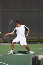 Milan Mihailovic (UT) defeated Jordan DeLass (GT) 6-4, 6-4.  The University of Texas (UT) men's tennis team defeated Georgia Tech (GT) Saturday, February 24, 2007..

Filename: SRM_20070224_1440085.jpg
Aperture: f/4.0
Shutter Speed: 1/8000
Body: Canon EOS-1D Mark II
Lens: Canon EF 80-200mm f/2.8 L