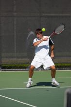 Milan Mihailovic (UT) defeated Jordan DeLass (GT) 6-4, 6-4.  The University of Texas (UT) men's tennis team defeated Georgia Tech (GT) Saturday, February 24, 2007..

Filename: SRM_20070224_1440106.jpg
Aperture: f/4.0
Shutter Speed: 1/8000
Body: Canon EOS-1D Mark II
Lens: Canon EF 80-200mm f/2.8 L