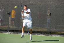 Texas' Dimitar Kutrovsky defeated Tech's Jose Muguruza 6-2 and 6-3.  The University of Texas (UT) men's tennis team defeated Georgia Tech (GT) Saturday, February 24, 2007..

Filename: SRM_20070224_1455525.jpg
Aperture: f/4.0
Shutter Speed: 1/4000
Body: Canon EOS-1D Mark II
Lens: Canon EF 80-200mm f/2.8 L