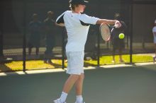 Josh Zavala (UT) was defeated by the Georgia Tech player.  The University of Texas (UT) men's tennis team defeated Georgia Tech (GT) Saturday, February 24, 2007..

Filename: SRM_20070224_1507462.jpg
Aperture: f/2.8
Shutter Speed: 1/2000
Body: Canon EOS-1D Mark II
Lens: Canon EF 80-200mm f/2.8 L