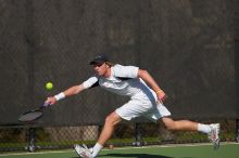 Rook Schellenberg (UT) defeated George Gvelesiani (GT) 6-3, 7-6.  The University of Texas (UT) men's tennis team defeated Georgia Tech (GT) Saturday, February 24, 2007..

Filename: SRM_20070224_1510266.jpg
Aperture: f/4.0
Shutter Speed: 1/4000
Body: Canon EOS-1D Mark II
Lens: Canon EF 80-200mm f/2.8 L