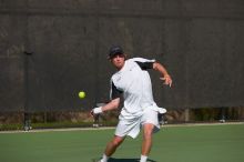 Rook Schellenberg (UT) defeated George Gvelesiani (GT) 6-3, 7-6.  The University of Texas (UT) men's tennis team defeated Georgia Tech (GT) Saturday, February 24, 2007..

Filename: SRM_20070224_1514307.jpg
Aperture: f/4.0
Shutter Speed: 1/4000
Body: Canon EOS-1D Mark II
Lens: Canon EF 80-200mm f/2.8 L