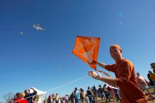 Chris Lam attempts to fly his UT kite at the 79th annual Zilker Park Kite Festival, Sunday, March 4, 2007.

Filename: SRM_20070304_1531487.jpg
Aperture: f/11.0
Shutter Speed: 1/250
Body: Canon EOS-1D Mark II
Lens: Sigma 15-30mm f/3.5-4.5 EX Aspherical DG DF