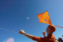 Chris Lam attempts to fly his UT kite at the 79th annual Zilker Park Kite Festival, Sunday, March 4, 2007.

Filename: SRM_20070304_1531584.jpg
Aperture: f/11.0
Shutter Speed: 1/250
Body: Canon EOS-1D Mark II
Lens: Sigma 15-30mm f/3.5-4.5 EX Aspherical DG DF