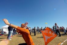 Chris Lam attempts to fly his UT kite at the 79th annual Zilker Park Kite Festival, Sunday, March 4, 2007.

Filename: SRM_20070304_1532028.jpg
Aperture: f/11.0
Shutter Speed: 1/250
Body: Canon EOS-1D Mark II
Lens: Sigma 15-30mm f/3.5-4.5 EX Aspherical DG DF