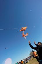 Madhav Tadikonda, class of 1997, and Anjali Patel, class of 1999, fly a UT kite at the 79th annual Zilker Park Kite Festival, Sunday, March 4, 2007.

Filename: SRM_20070304_1538229.jpg
Aperture: f/11.0
Shutter Speed: 1/250
Body: Canon EOS-1D Mark II
Lens: Sigma 15-30mm f/3.5-4.5 EX Aspherical DG DF