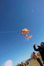 Madhav Tadikonda, class of 1997, and Anjali Patel, class of 1999, fly a UT kite at the 79th annual Zilker Park Kite Festival, Sunday, March 4, 2007.

Filename: SRM_20070304_1538240.jpg
Aperture: f/11.0
Shutter Speed: 1/250
Body: Canon EOS-1D Mark II
Lens: Sigma 15-30mm f/3.5-4.5 EX Aspherical DG DF