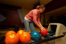 Laura Fair reaching for a bowling ball.  Alpha Xi Delta held a sock hop themed date night at the Austin 300 bowling alley, Thursday night, March 29, 2007.

Filename: SRM_20070329_2022483.jpg
Aperture: f/8.0
Shutter Speed: 1/200
Body: Canon EOS-1D Mark II
Lens: Sigma 15-30mm f/3.5-4.5 EX Aspherical DG DF