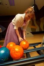 Amanda Young reaching for a bowling ball.  Alpha Xi Delta held a sock hop themed date night at the Austin 300 bowling alley, Thursday night, March 29, 2007.

Filename: SRM_20070329_2024224.jpg
Aperture: f/8.0
Shutter Speed: 1/200
Body: Canon EOS-1D Mark II
Lens: Sigma 15-30mm f/3.5-4.5 EX Aspherical DG DF