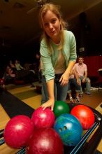 Alice Aertker reaching for a bowling ball.  Alpha Xi Delta held a sock hop themed date night at the Austin 300 bowling alley, Thursday night, March 29, 2007.

Filename: SRM_20070329_2103187.jpg
Aperture: f/8.0
Shutter Speed: 1/200
Body: Canon EOS-1D Mark II
Lens: Sigma 15-30mm f/3.5-4.5 EX Aspherical DG DF