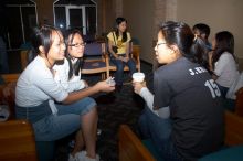 Thu Mai, Thu Vo, and Julia Kuo talking.  The Asian Business Students Association (ABSA) hosted a chocolate fondue Friday, January 26, 2007 before heading off to a movie premier.

Filename: SRM_20070126_1621186.jpg
Aperture: f/5.6
Shutter Speed: 1/125
Body: Canon EOS 20D
Lens: Canon EF-S 18-55mm f/3.5-5.6