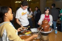 D'Andra Thomas-Jackson, Ian McCoy, and Christina Canales enjoy the chocolate fondue.  The Asian Business Students Association (ABSA) hosted a chocolate fondue Friday, January 26, 2007 before heading off to a movie premier.

Filename: SRM_20070126_1622507.jpg
Aperture: f/5.0
Shutter Speed: 1/125
Body: Canon EOS 20D
Lens: Canon EF-S 18-55mm f/3.5-5.6