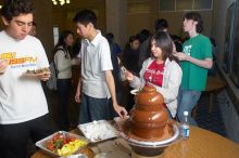 D'Andra Thomas-Jackson, Ian McCoy, and Christina Canales enjoy the chocolate fondue.  The Asian Business Students Association (ABSA) hosted a chocolate fondue Friday, January 26, 2007 before heading off to a movie premier.

Filename: SRM_20070126_1622568.jpg
Aperture: f/5.0
Shutter Speed: 1/125
Body: Canon EOS 20D
Lens: Canon EF-S 18-55mm f/3.5-5.6