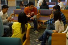 Eddy Fong, Eric Chang, Faris Virani, Misa Bui, and Sophia Lee enjoying their evening.  The Asian Business Students Association (ABSA) hosted a chocolate fondue Friday, January 26, 2007 before heading off to a movie premier.

Filename: SRM_20070126_1635083.jpg
Aperture: f/2.2
Shutter Speed: 1/50
Body: Canon EOS-1D Mark II
Lens: Canon EF 50mm f/1.8 II